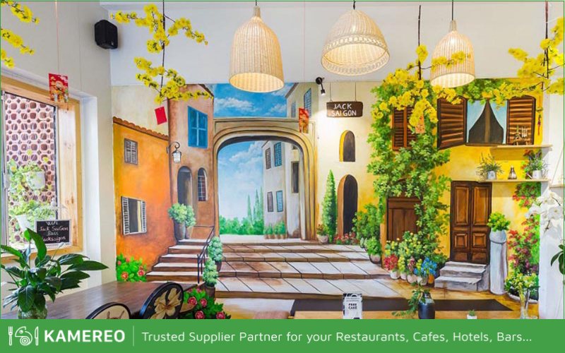 Wall-hanging paintings with Tet themes create a focal point for the cafe space