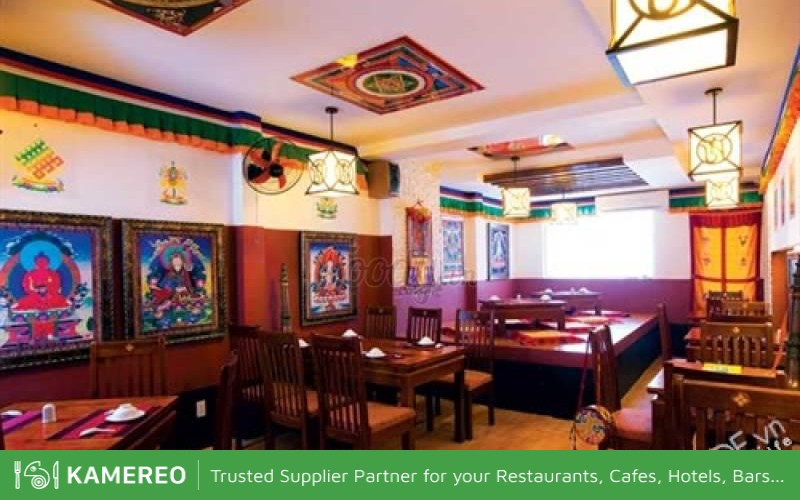 The space of the restaurant is decorated with many Tibetan Buddhist patterns