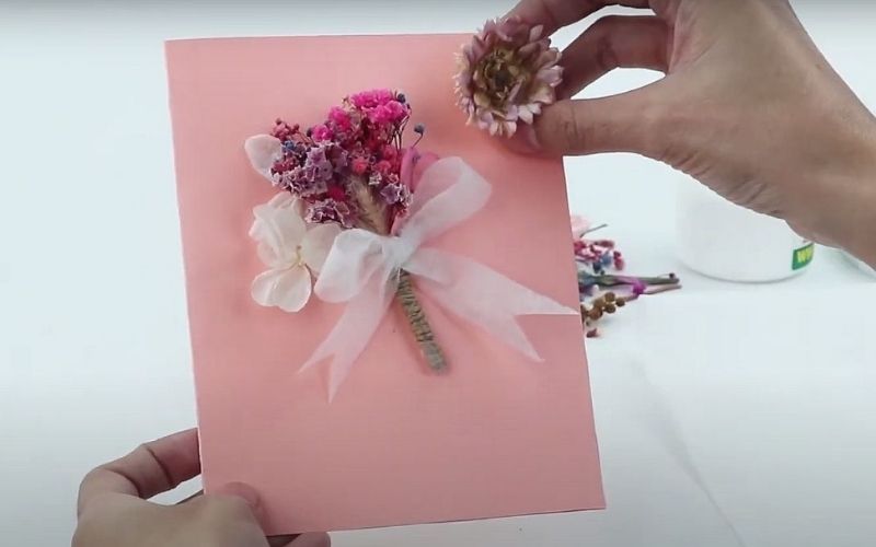 Stick the flower bouquet onto card, wait for glue to dry to complete handmade card