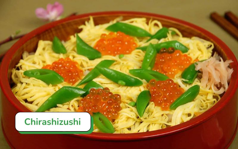 Chirashizushi - A colorful bowl of sushi, rice topped with seafood, meat, and eggs