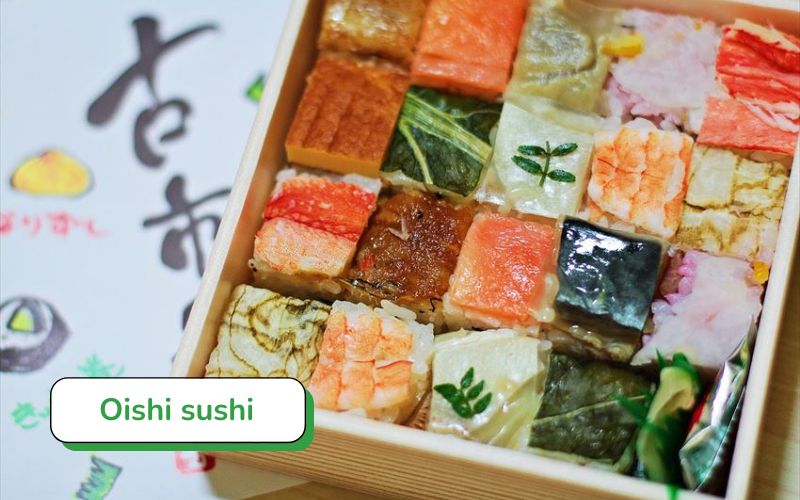 Oishi sushi - A unique sushi variation with pressed rice and layered ingredients