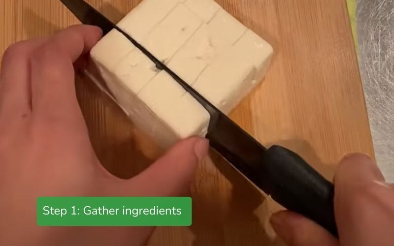 Tofu is cut into small, bite-sized squares