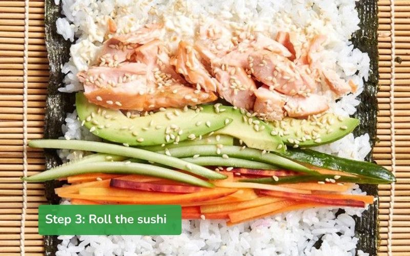 Steps to roll salmon avocado sushi with a bamboo mat