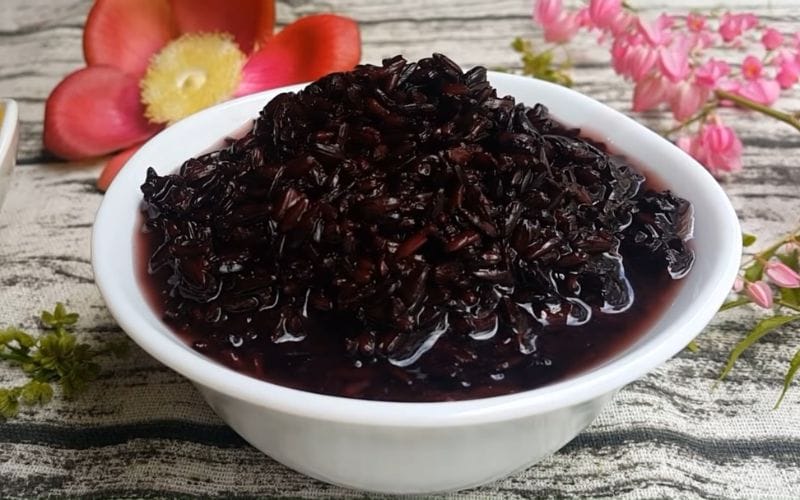 Fermented black sticky rice: A traditional dish believed to be good for health on Doan Ngo Festival