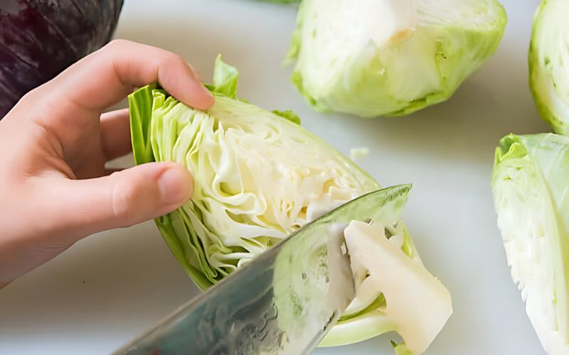 Cabbage should be divided into 4 lengthwise sections before cutting