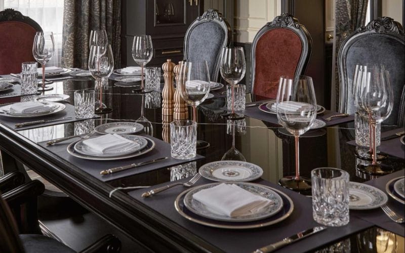 Properly placing the charger plate in the table setting