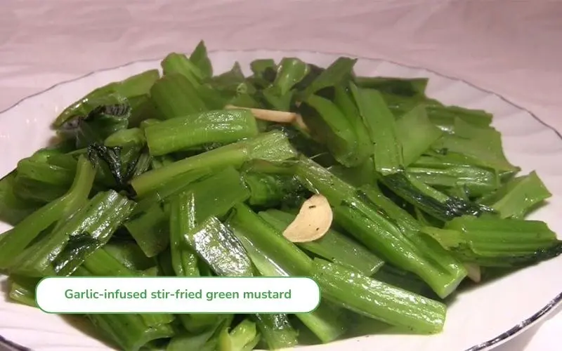 Stir-fried mustard greens with garlic is quick, maintaining its crispness