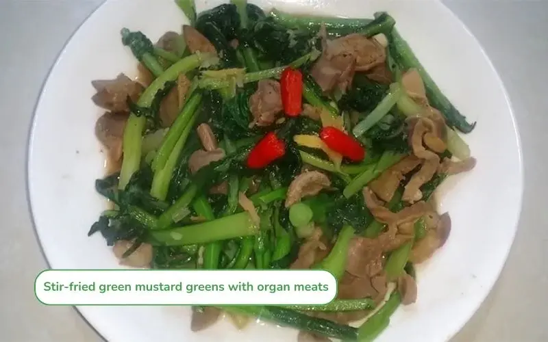 Stir-fried mustard greens with offal is a rustic, rich, and delicious dish with rice