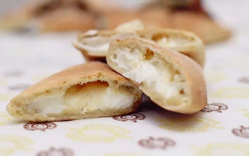 Whole-wheat pita bread with low-fat ricotta cheese for a nutritious snack