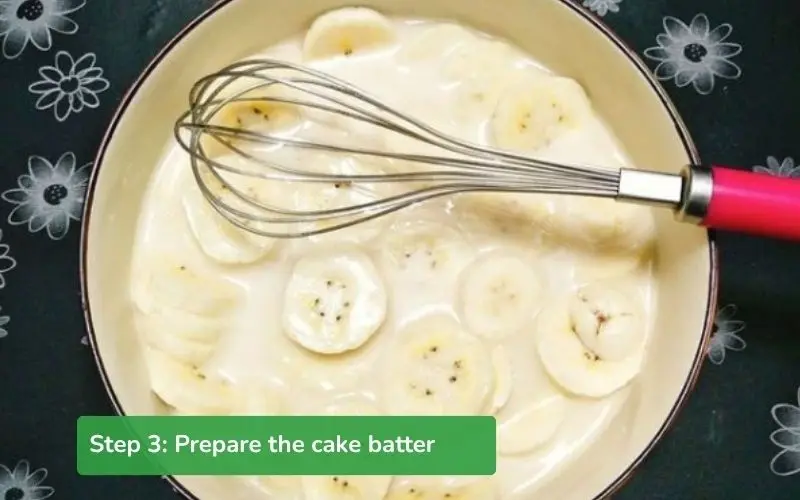 Bananas are gently mixed with the flour, ready to be poured into the mold for steaming