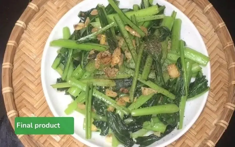 The finished stir-fried choysum are vibrant green and appealing