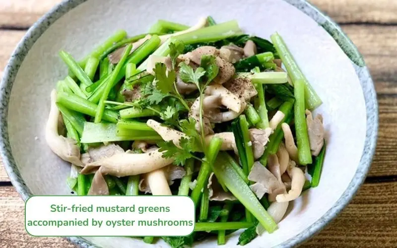 Stir-fried mustard greens with oyster mushrooms are chewy, crisp, and good for your health