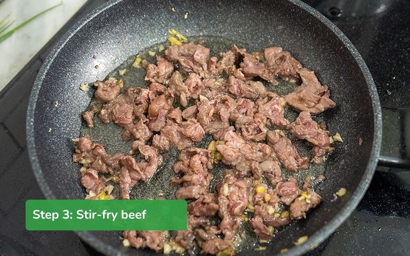 Stir-fry beef in a pan