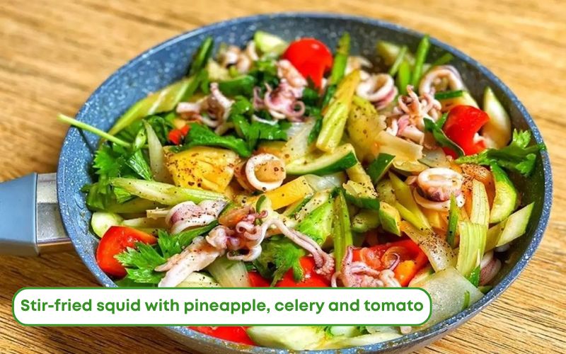Sweet and sour stir-fried squid with pineapple, celery, and tomato, crispy, fresh, and eye-catching