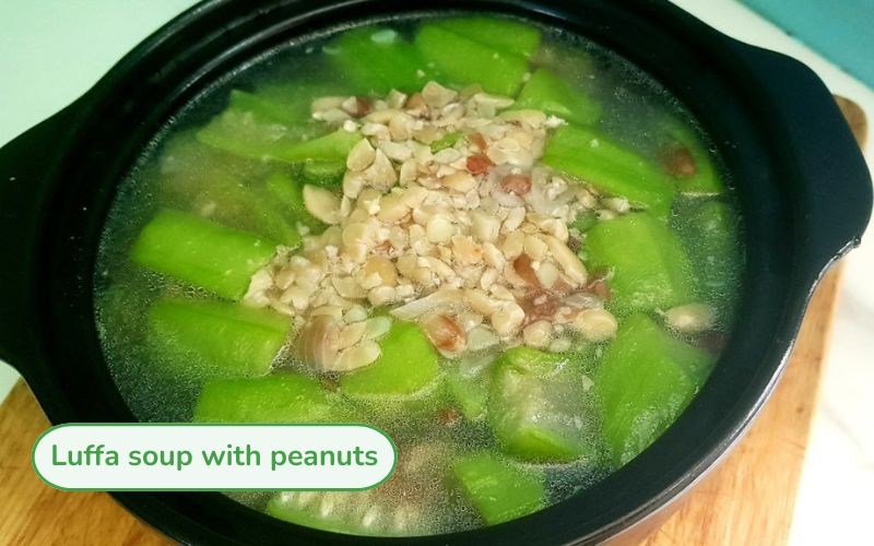 Luffa soup cooked with peanuts with soft green luffa and fatty peanuts floating in clear, sweet broth