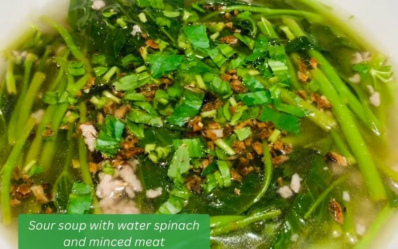 Finished sour soup with water spinach and minced meat.
