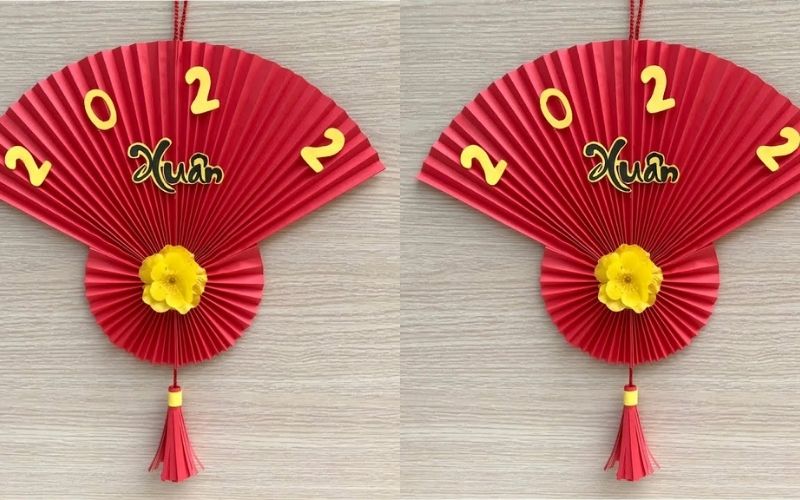 Vẽ chữ lên quạt giấy trang trí ngày Tết