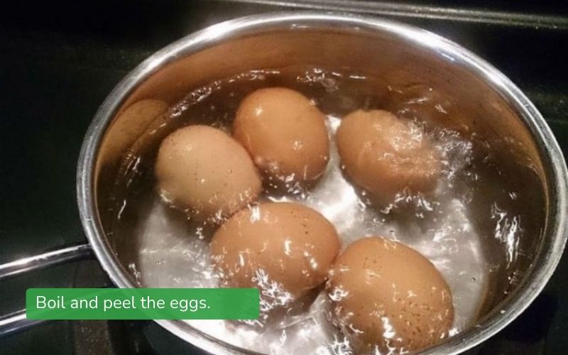 Boiled duck eggs, peeled, ready for braised pork.