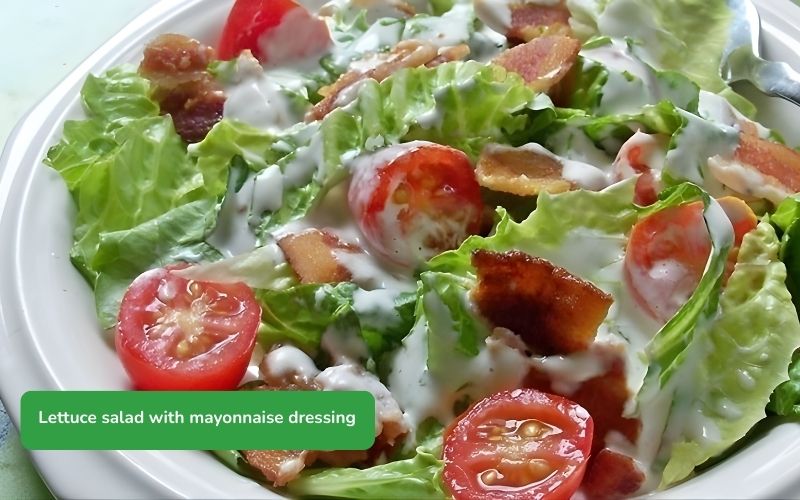 Fresh and delicious lettuce salad with mayonnaise, crisp vegetables.