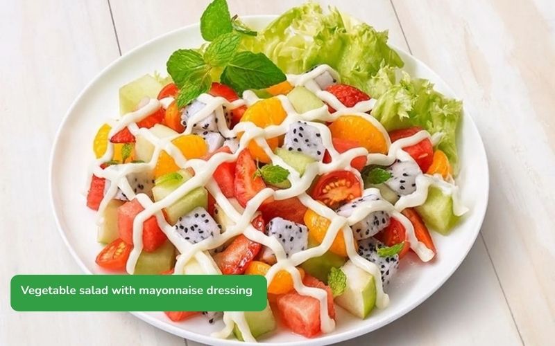 A delicious and colorful mixed vegetable salad with fresh mayonnaise dressing.