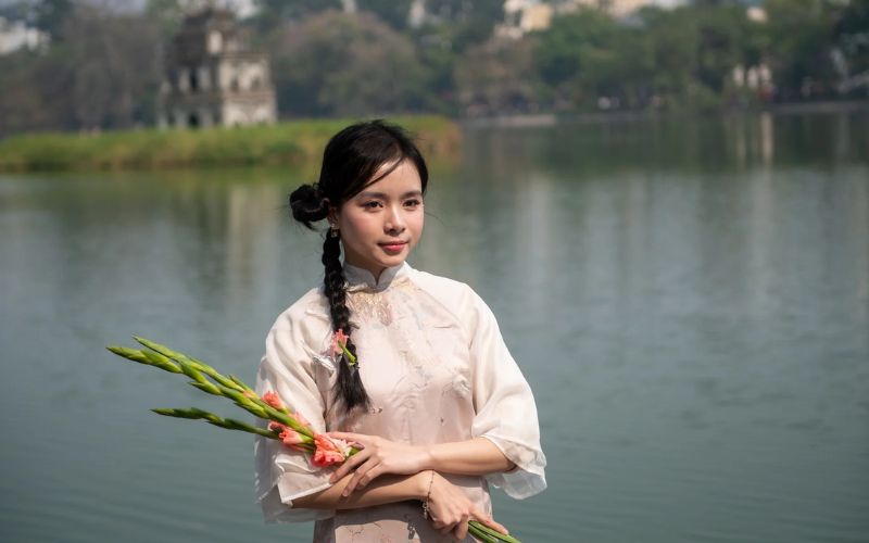 Posing in front of Ho Guom Lake
