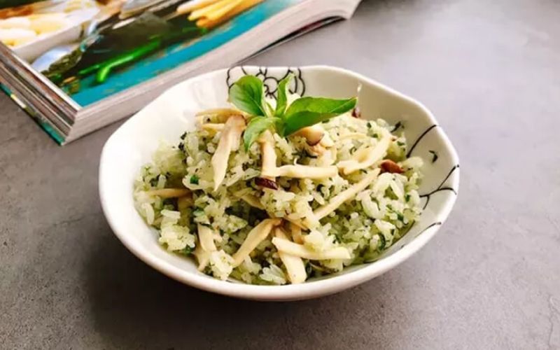 Fried rice with basil leaves and king oyster mushrooms - visually appealing and delicious.