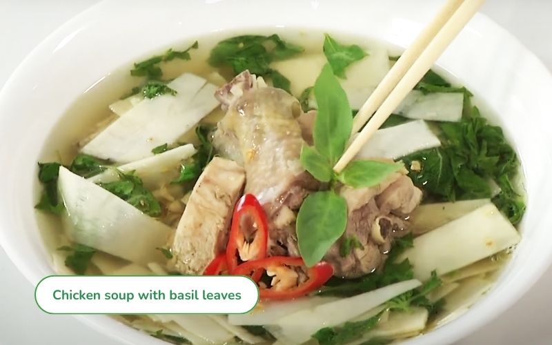 Delicious chicken soup with basil leaves