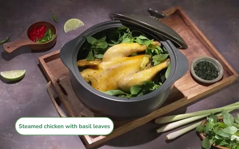 Delicious steamed chicken with basil leaves